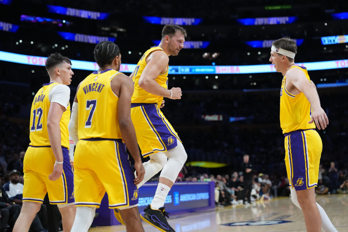 Luka Doncic, Austin Reaves, Gabe Vincent, and Jake Laravia Lakers