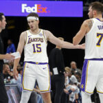 Luka Doncic, Austin Reaves, and JJ Redick Lakers