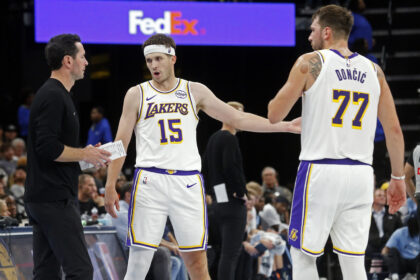 Luka Doncic, Austin Reaves, and JJ Redick Lakers